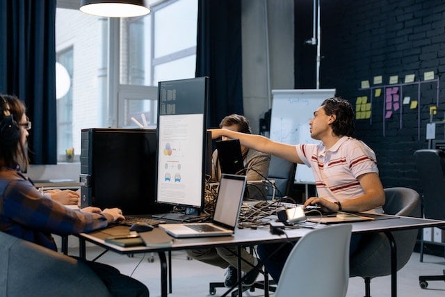 group of people working in an office